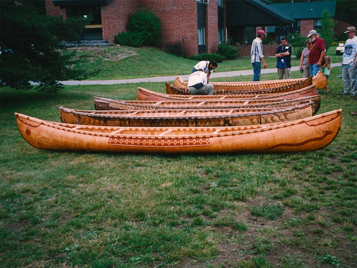 Aputamkon with other birchbark canoes at the Wooden Canoe Heritage Association Assembly 2003