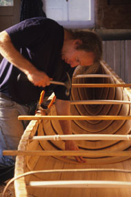 Steve ribbing a canoe