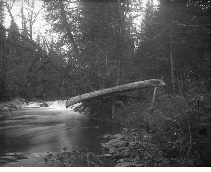 Portaging a canoe at Green River, near Edmundston, N.B., 1887