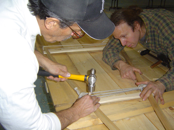 Nick Dow pegging thwarts in gunwale mortises